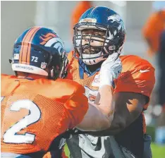  ?? Steve Nehf, Denver Post file ?? Guard Ron Leary, right, working with tackle Garett Bolles, had a solid opener against Seattle.