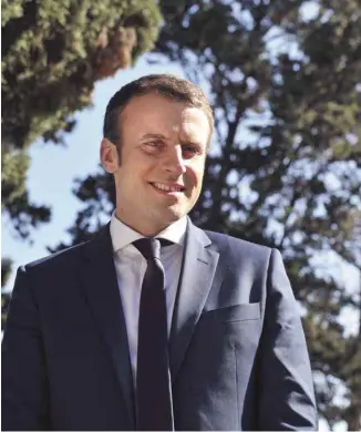  ?? STR / AGENCE FRANCE-PRESSE ?? Alors qu’il visitait l’Algérie cette semaine, Emmanuel Macron a qualifié la colonisati­on française de «crime contre l’humanité», ce qui a soulevé un tollé dans toute la France.