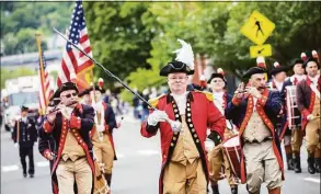  ?? Jason Edwards / Hearst Connecticu­t Media file photo ?? Doug Jennings of the Mattatuck Drum Band marches in the Derby-Shelton Memorial Day Parade on May 31 2021.