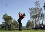  ?? RYAN KANG - THE ASSOCIATED PRESS ?? Tiger Woods tees off on the 12th hole during the final round of the Genesis Invitation­al golf tournament at Riviera Country Club, Sunday, Feb. 16, 2020, in the Pacific Palisades area of Los Angeles.