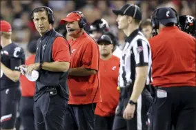  ?? KAREEM ELGAZZAR — THE ASSOCIATED PRESS ?? Cincinnati coach Luke Fickell looks down the sideline during the second half of the team’s game against UCLA on Aug. 29 in Cincinnati.