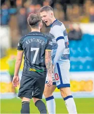  ??  ?? Making amends: Caley Thistle’s James Keatings has words with Morton’s Jack Baird on Saturday