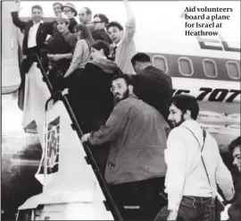  ?? PHOTO: ALAMY ?? Aid volunteers board a plane for Israel at Heathrow