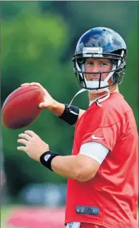  ?? By Dale Zanine, US Presswire ?? Falling short: Matt Ryan, warming up in organized team activities this month, is 43-19 in the regular season but 0-3 in the playoffs.