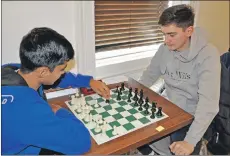  ?? 15_T47 chesscongr­ess_Sam Coates ?? Oban’s Sam Coates enjoys a warm up session with Glasgow’s Sambhav Chadha.