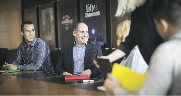  ?? TIM FRASER FOR NATIONAL POST ?? Dan McGrath, chief operating officer of Cineplex Entertainm­ent, and members of the Cineplex team in a strategy session.