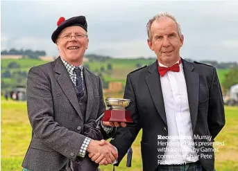  ?? ?? Recognitio­n Murray Henderson was presented with a quaich by Games committee chair Pete Richardson
