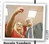  ??  ?? Bernie Sanders & fan take selfie at "Brunch With Bernie" event.