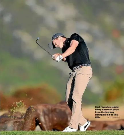  ?? GETTY IMAGES ?? First round co-leader Harry Bateman plays from the fairway during his 64 at The Hills.64:67:68: