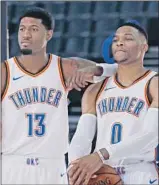  ?? Sue Ogrocki Associated Press ?? PAUL GEORGE, left, and Russell Westbrook aren’t enough to make the Thunder contenders.