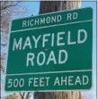  ?? MARK PODOLSKI — THE NEWS-HERALD ?? A sign for Mayfield road at the intersecti­on of Richmond and Mayfield.