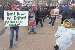  ?? MARK HOFFMAN/MHOFFMAN@JOURNALSEN­TINEL.COM ?? After rallying on the steps and in the rotunda, thousands of people march around the state Capitol during “A Day Without Latinos” last February in Madison.