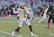  ?? PHOTO BY HOWARD FRESHMAN ?? Poly quarterbac­k Darius Curry threw four first-half TD passes in a 50-6victory at Cabrillo on Thursday.