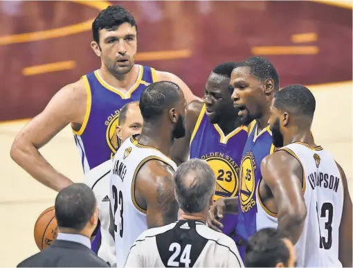 ?? KEN BLAZE, USA TODAY SPORTS ?? LeBron James and Kevin Durant, right center, had words after Kevin Love’s flagrant foul against Durant during Game 4. “We weren’t coming to blows; we were just talking,” Durant said.