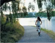  ?? Rick Steves ?? A bike ride through the island of Djurgården is a peaceful way to see a different side of Stockholm.