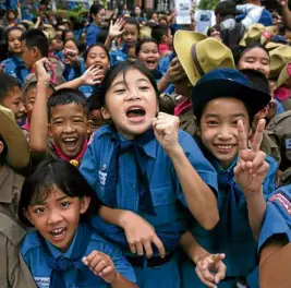  ?? —REUTERS ?? GRATITUDE AND EXHILARATI­ON Thai students react with relief, gratitude and exhilarati­on after the last group of the Wild Boars soccer team was rescued.