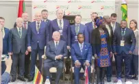  ?? ?? Vice President Constantin­o Chiwenga poses for a group photo with Industry and Commerce Minister Sekesai Nzenza and Belarusian businesspe­ople during a meeting in Harare yesterday
