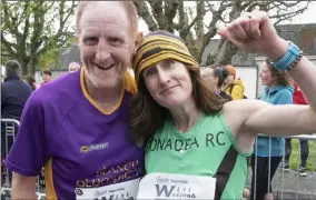  ??  ?? Michael Quigley and Charlotte Kearney, who was the second lady home in the half marathon.