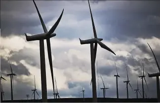  ??  ?? Energy giants: But power companies believe wind farms are the future
