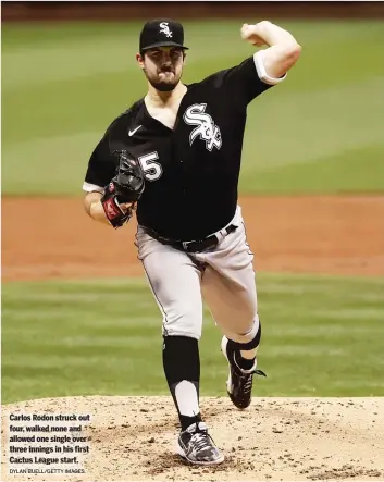  ?? DYLAN BUELL/GETTY IMAGES ?? Carlos Rodon struck out four, walked none and allowed one single over three innings in his first Cactus League start.