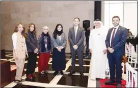  ?? ?? A group picture featuring several executives of Gulf Bank, with the Deputy CEO in the center.