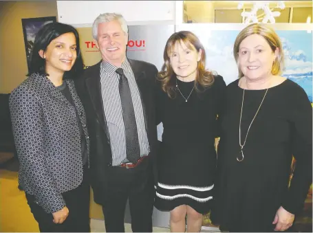  ?? BILL BROOKS ?? From left, at the Calgary Prostate Cancer Centre Jingle Bell Mingle held Dec. 12 are PCC board members Nipa Chakravart­i, David Ferguson, Dr. Shelley Spaner and PCC executive director Pam Heard.