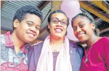  ?? Picture: ELIKI NUKUTABU ?? Catherine Raiyawa (middle) is flanked by her cousins, Mereula Vukeiono (left) and Enna Kolikata.