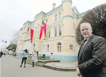  ?? LAM, TIMES COLONIST ADRIAN ?? David Leverton, executive director of the Maritime Museum, stands in front of the museum’s former site in Bastion Square. The museum, now based on Humboldt Street, has proposed a $45-million plan that would see it move back to its home of 50 years and establish itself as a national maritime museum with arts and cultural programs.