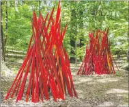  ?? Photo from Crystal Bridges Museum of America Art ?? The artwork titled ‘Red Reeds’ sits along a wooded path at Crystal Bridges Museum of American Art.