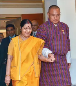  ?? — PTI ?? Bhutanese Prime Minister Tshering Tobgay with minister for external affairs Sushma Swaraj before a meeting in New Delhi on Thursday.