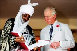  ??  ?? Britain’s Prince Charles with the Emir of Kano Lamido Sanusi during his meeting with Traditiona­l Leaders at the British High Commission residence in Abuja, Nigeria, on Wednesday
