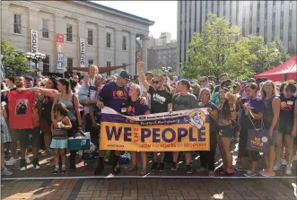  ?? PHOTOS BY KATIE WEDELL / STAFF ?? Thousands turned out Sunday for the Families of Addicts’ local support group’s fifth annual Rally 4 Recovery on Courthouse Square in downtown Dayton.