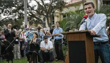  ?? ANDRES LEIVA / THE PALM BEACH POST ?? Cameron Kasky, 17, a student at Marjory Stoneman Douglas High School in Parkland, speaks to a rally Monday outside City Hall in Delray Beach. Kasky called out politician­s who take NRA donations.