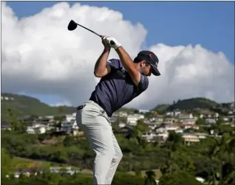  ?? MATT YORK — THE ASSOCIATED PRESS ?? Taylor Montgomery hits from the 14th tee during the first round of the Sony Open on Thursday at Waialae Country Club in Honolulu.