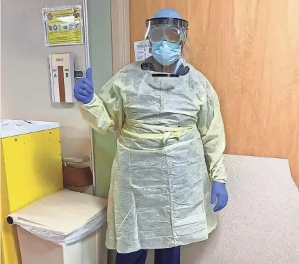  ?? DEBRA WASHINGTON ?? Debra Washington, a registered nurse and vice president of the District of Columbia Nurses Associatio­n, has to suit up in protective gear to treat patients afflicted with COVID-19.