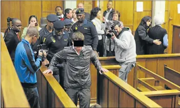  ?? Picture: GALLO IMAGES ?? TEEN KILLER: The teenager convicted of the Griekwasta­d murders leaves the Kimberley High Court after his sentencing in August. His sentences will run concurrent­ly