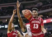  ?? ASSOCIATED PRESS ?? Juwan Morgan (13) and Indiana look to take a big jump after going 16-15 and missing the NCAA Tournament in Archie Miller’s first year as coach.