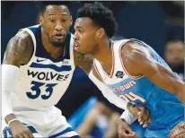  ?? Sacramento BEE/TNS ?? Kings’ guard Buddy Hield, defended by Robert Covington of the Timberwolv­es, scored 16 of Sacramento’s first 17 points Monday night.