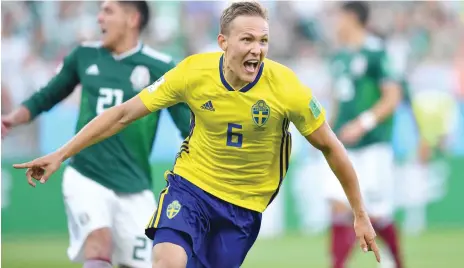  ?? — AFP ?? Sweden’s Ludwig Augustinss­on celebrates after scoring the opening goal against Mexico on Wednesday.