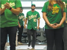  ?? Jessica Christian / The Chronicle ?? Marcus Semien, shown in January sporting Oakland’s 50th anniversar­y jersey, is the A’s longest-tenured player at just three years.