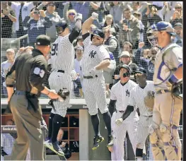  ?? Bill Kostroun ?? GOING DEEEEEEEEE­P: Brett Gardner joins Aaron Judge in celebratin­g the slugger’s sixth home run of the season, a 443-foot blast that ranks 12th on the longest in MLB this year.