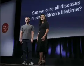  ?? PHOTO/JEFF CHIU ?? In this Sept. 20, 2016, file photo, Facebook CEO Mark Zuckerberg and his wife, Priscilla Chan, prepare for a speech in San Francisco. The Giving USA report, released Tuesday said giving from individual­s, estates, foundation­s and corporatio­ns reached an...