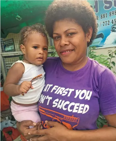  ?? Photo: Renu Radhika ?? Esita Talei with her nine-month-old daughter at the Labasa market on May 2, 2020.