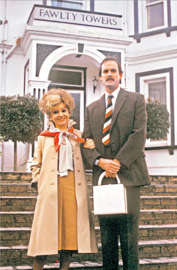  ?? ?? Everything Basil did was motivated by his terror of Sybil: John Cleese on set with Prunella Scales in 1979
Fawlty Towers: The Play opens at the Apollo Theatre, London W1 (FawltyTowe­rsWestend.com) on May 4