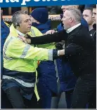  ?? REX ?? Hands off: Lambert is handled by a Norwich steward