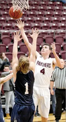  ?? Bud Sullins/Special to Siloam Sunday ?? Siloam Springs senior Charlie Jones, right, scored 16 points, but the Panthers saw their season end Tuesday with a 63-52 loss to Greenwood in a 6A-West Conference Tournament game played at the Panther Activity Center.