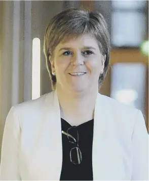  ??  ?? 0 First Minister Nicola Sturgeon has written a letter to relatives of three Scottish soldiers executed in 1971 apologisin­g for John Mason’s statements online