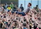  ??  ?? Mobbed … James Blunt crowd surfs at the Invictus Games opening ceremony in London, 2014. Photograph: Chris Jackson/ Getty Images