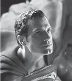  ?? HBO MAX ?? Superman ( Henry Cavill) rocks a new black suit in “Zack Snyder’s Justice League.”