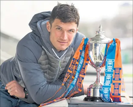  ?? Picture: SNS ?? SILVER SERVICE: John Sutton poses with the Irn-Bru Cup ahead of today’s final against Dundee United.